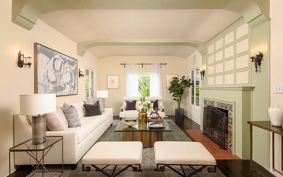 Housing market featuring a stunning living room with a white color theme.