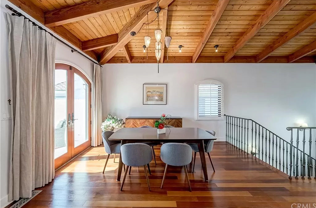 Homeownership featuring a beautiful dining room with hardwood flooring.