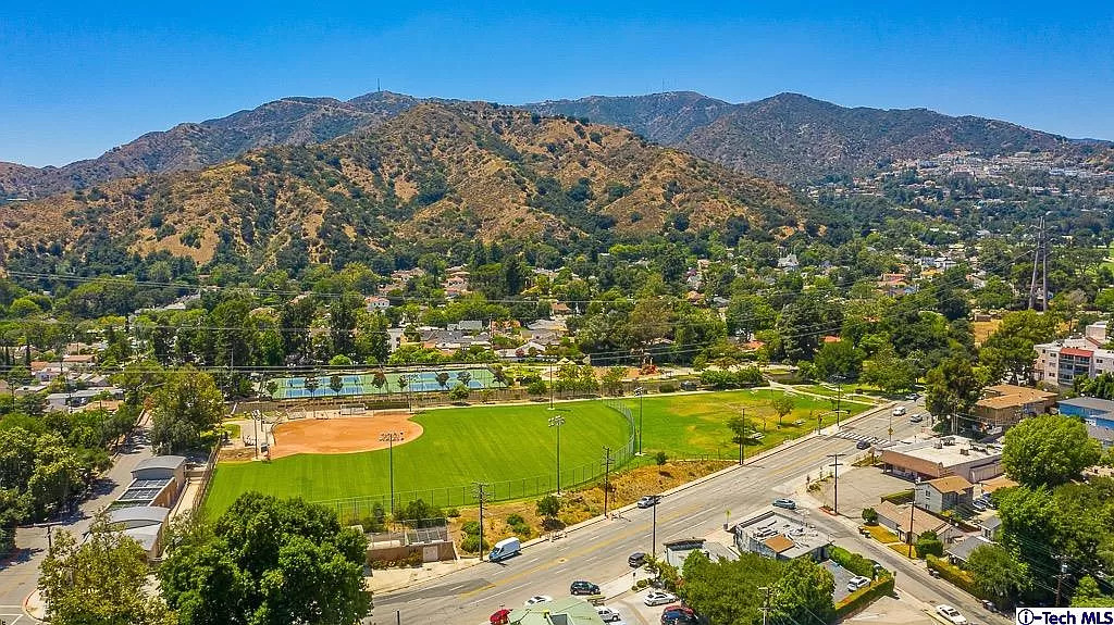 Housing market featuring a local community park.