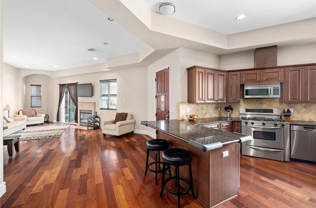 Beautiful kitchen featuring brown and white color schemes.