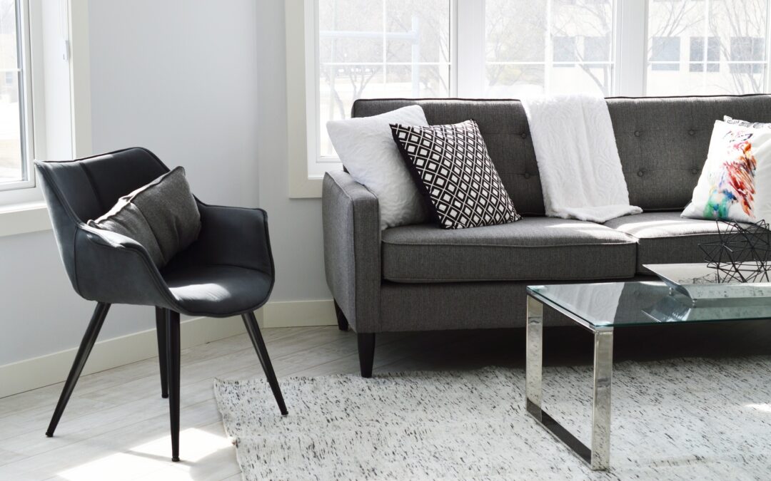 black and white decor, black seat with black couch and white pillows in contemporary Los Angeles home